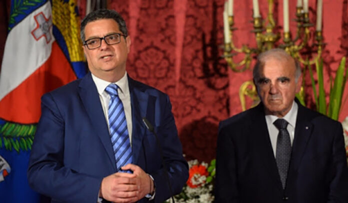 george vella adrian delia