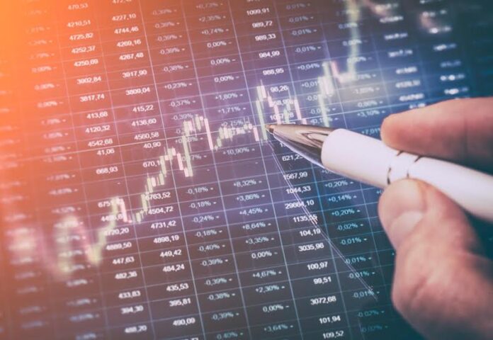 Candle stick graph and bar chart of stock market investment trading. Analysis Forex price display on computer screen.