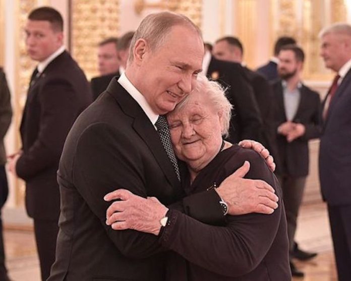 Putin u l-għalliema tiegħu