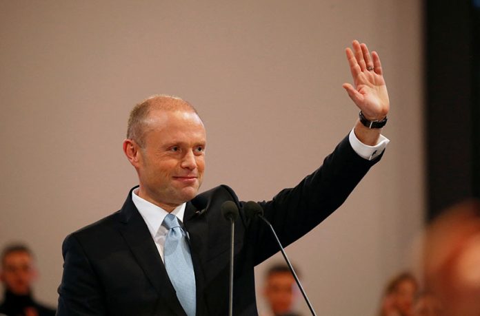 FILE PHOTO: Outgoing Prime Minister and Labour Party leader Joseph Muscat waves to supporters after his final speech at the party's Congress before the election of a new party leader at the Corradino Sports Pavilion in Paola
