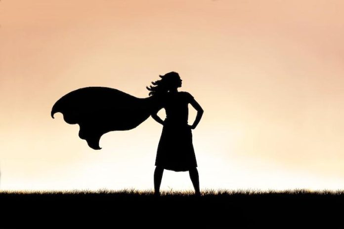 a-woman-silhouette-with-cape-showing-that-she-belongs-to-power-people