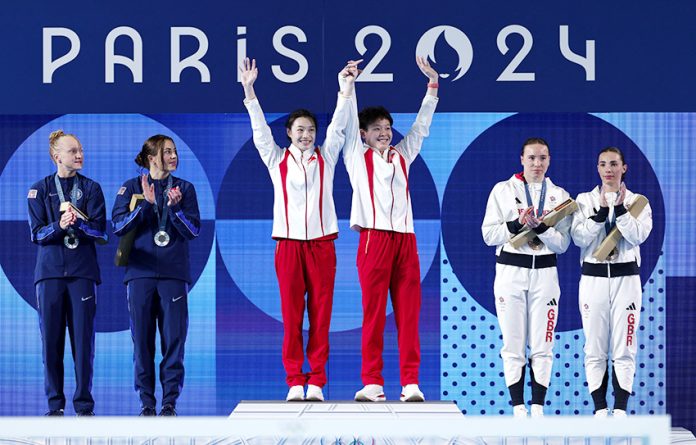 Diving - Women's Sync 3m Springboard Victory Ceremony