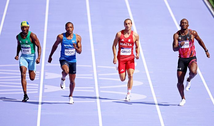 Athletics - Men's 100m Preliminary Round