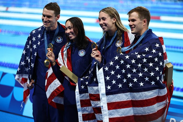 Swimming - Mixed 4 x 100m Medley Relay Victory Ceremony