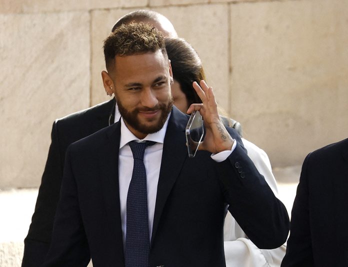 Brazil's Neymar to stand trial in a corruption case over his transfer to FC Barcelona