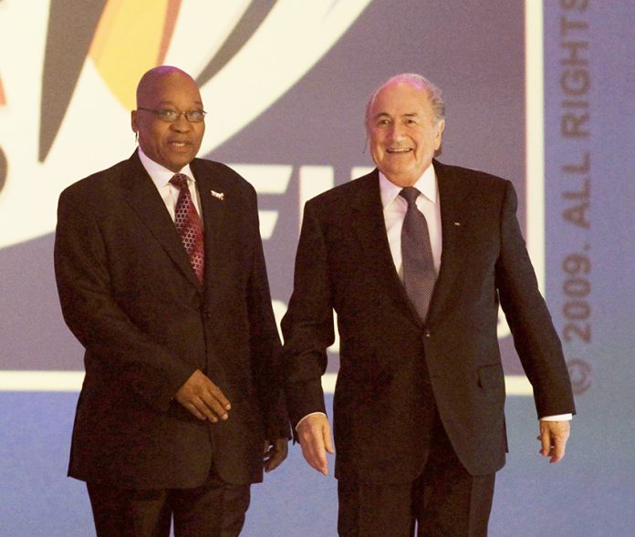 South African President Zuma and FIFA president Blatter speak during a ceremony before the 2010 World Cup draw in Cape Town