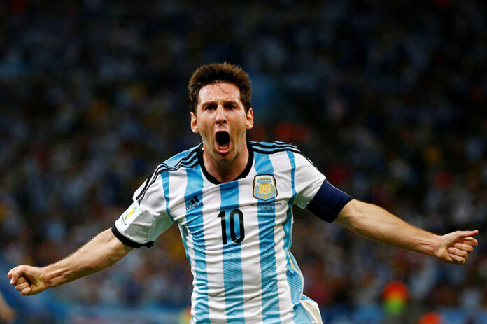 FILE PHOTO: Argentina's Lionel Messi celebrates scoring a goal during the 2014 World Cup Group F soccer match against Bosnia and Herzegovina at the Maracana stadium in Rio de Janeiro