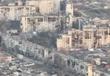 Waqfien mill-ġlied f’belt fl-Ukrajna fejn ir-residenti qed ibatu l-ġuħ